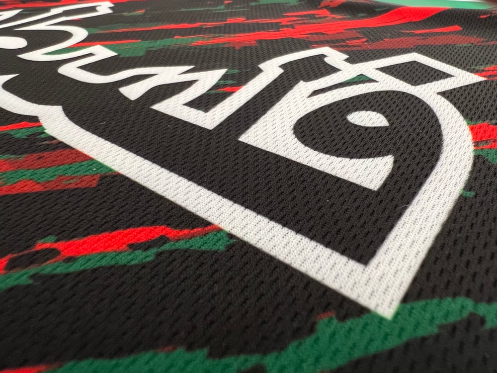 Camiseta de futebol Palelstina decorada com respingos de tinta - Loja Al Baraka