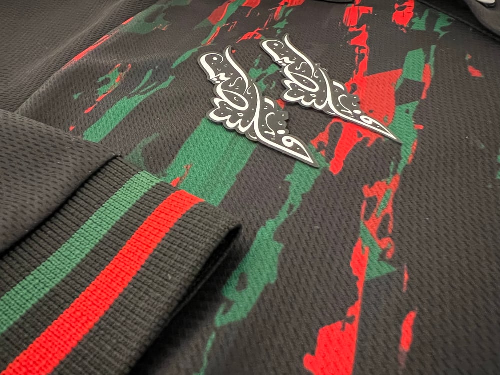 Camiseta de futebol Palelstina decorada com respingos de tinta - Loja Al Baraka